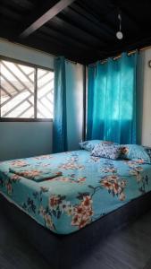 Postel nebo postele na pokoji v ubytování Casa frente al mar en la montaña