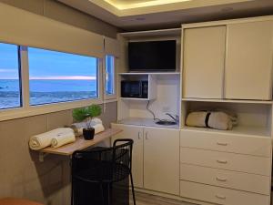 Η κουζίνα ή μικρή κουζίνα στο Ayres Dorados Lodge Hotel +13 φωτογραφίες