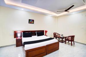 Кровать или кровати в номере Hotel O Nova Resorts & Luxury Farm