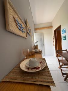 a dining room with a table with a plate on it at Sal & Sol in Cruz