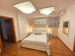 Postel nebo postele na pokoji v ubytování Donna Rosa