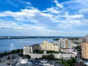 a view of a city with a river and buildings at Мост сити АПП 52 Джакузи in Dnipro