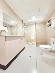 Koupelna v ubytování Waterfront Sunset Apartment Nadi