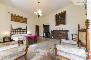 Postel nebo postele na pokoji v ubytování Hotel Urania