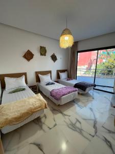 Postel nebo postele na pokoji v ubytování Hostel Atlantic view Tamraght