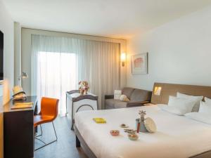 Postel nebo postele na pokoji v ubytování Novotel Barcelona City