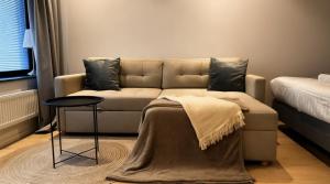 Ένα ή περισσότερα κρεβάτια σε δωμάτιο στο Skyline Premium Suites