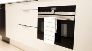 Η κουζίνα ή μικρή κουζίνα στο Skyline Premium Suites