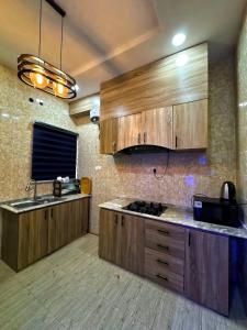 Кухня или мини-кухня в Hideout, Wuye
