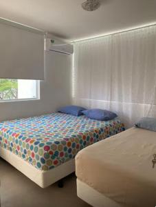 Postel nebo postele na pokoji v ubytování Oceanfront Apartment 2BR 2BA at Jama Campay includes Resort Access