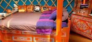 a childs bedroom with a bed in a play house at Yourte Voyageuse in Charette +12 photos