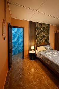 Ένα ή περισσότερα κρεβάτια σε δωμάτιο στο Ethlyn House