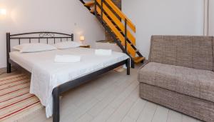 Ένα ή περισσότερα κρεβάτια σε δωμάτιο στο Studio Gata 6033a