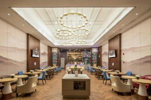 Restaurace v ubytování 南宁江南万达白沙大道怡程酒店