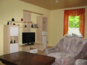 Kuchyň nebo kuchyňský kout v ubytování Ferienwohnung Mit Terrasse