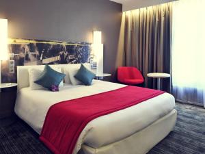 Postel nebo postele na pokoji v ubytování Mercure Paris Gare de l'Est