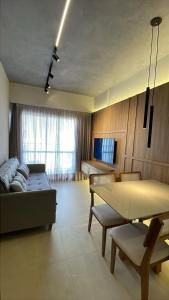 TV a/nebo společenská místnost v ubytování TS402-Apê lindo e aconchegante p/ 4 pessoas na praia