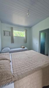 Postel nebo postele na pokoji v ubytování Casa do Pepe em Barra de Jacuípe