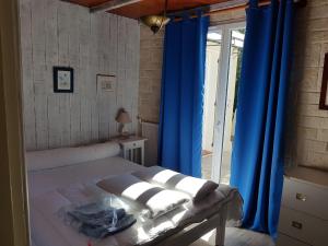 Postel nebo postele na pokoji v ubytování Charmante 3 Villa La Milouyette