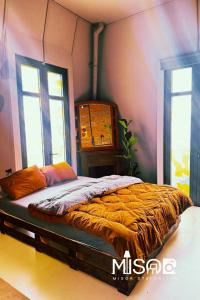 Postel nebo postele na pokoji v ubytování Celine's Loft