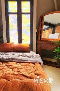 Postel nebo postele na pokoji v ubytování Celine's Loft