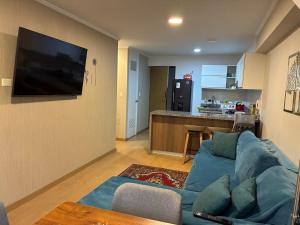 Televiisor ja/või meelelahutuskeskus majutusasutuses Magical View Parque de las Aguas, central apartment