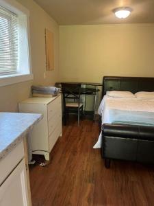 Ένα ή περισσότερα κρεβάτια σε δωμάτιο στο one bedroom with bathroom