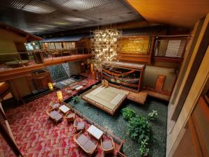 an overhead view of a hotel lobby with chairs and a couch at Hamanoyu in Suwa