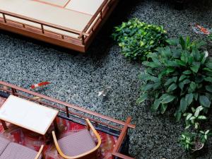 an overhead view of a patio with chairs and plants at Hamanoyu in Suwa +58 photos