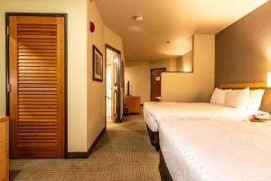 Ένα ή περισσότερα κρεβάτια σε δωμάτιο στο Westmark Fairbanks Hotel and Conference Center