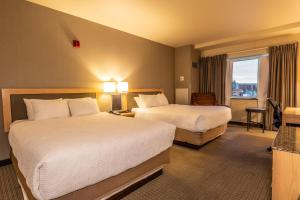 Ένα ή περισσότερα κρεβάτια σε δωμάτιο στο Westmark Fairbanks Hotel and Conference Center +34 φωτογραφίες