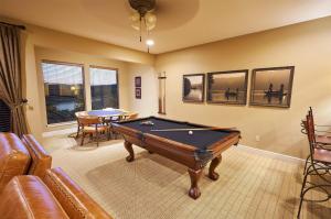 a living room with a pool table in it at Hilton Grand Vacations Club Long Creek Ridgedale in Ridgedale