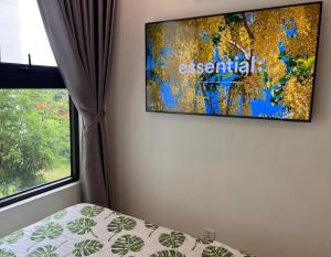 TV a/nebo společenská místnost v ubytování Vinhomes Grand Park Homestay House