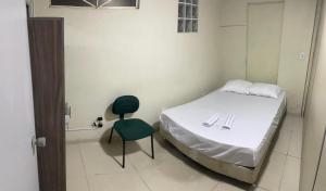 Ένα ή περισσότερα κρεβάτια σε δωμάτιο στο Los Hermanos