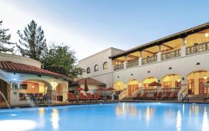 a large swimming pool in front of a building at Hilton Vacation Club Los Abrigados Resort & Spa Sedona in Sedona