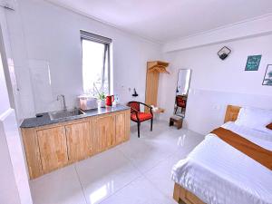 Ένα ή περισσότερα κρεβάτια σε δωμάτιο στο Villa Trung Nghĩa Đà Lạt