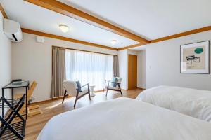 Postel nebo postele na pokoji v ubytování Villa Lina