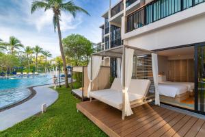 Bazén v ubytování Le Meridien Phuket Mai Khao Beach Resort nebo v jeho okolí