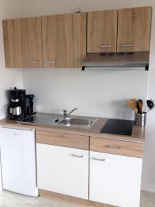 Kuchyň nebo kuchyňský kout v ubytování Ferienwohnung In Patzig Mit Großer Terrasse