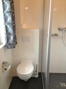 Koupelna v ubytování Ferienwohnung In Patzig Mit Großer Terrasse + 3 fotografie