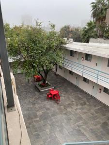 an overhead view of a building with a red table at Habitacion C10 privada centro monterrey in Monterrey