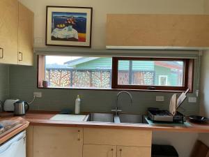 Kuchyň nebo kuchyňský kout v ubytování Forest Walks Studio