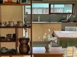 Kuchyň nebo kuchyňský kout v ubytování Forest Walks Studio