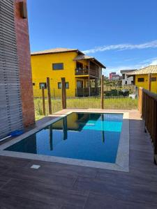 Hồ bơi trong/gần Flat Manaí 01