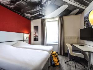 Postel nebo postele na pokoji v ubytování Ibis Styles Strasbourg Centre Gare