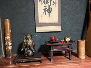 Gallery image of OldJapaneseHouseintheMountains山の中の築100年古民家赤目のやど in Nabari