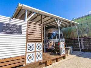 a small building with a train inside of it at Air Stream House Nakasone in Nakijin