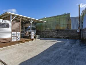 a building with a bus inside of it at Air Stream House Nakasone in Nakijin +52 photos