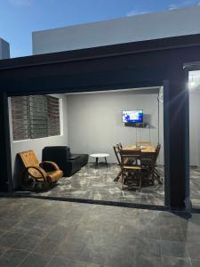 TV a/nebo společenská místnost v ubytování RoofTop Appart Nouvelle Ville