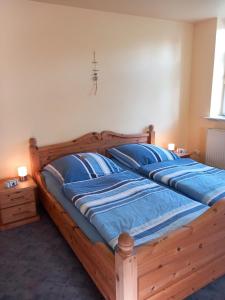 Postel nebo postele na pokoji v ubytování Mooij Plaats